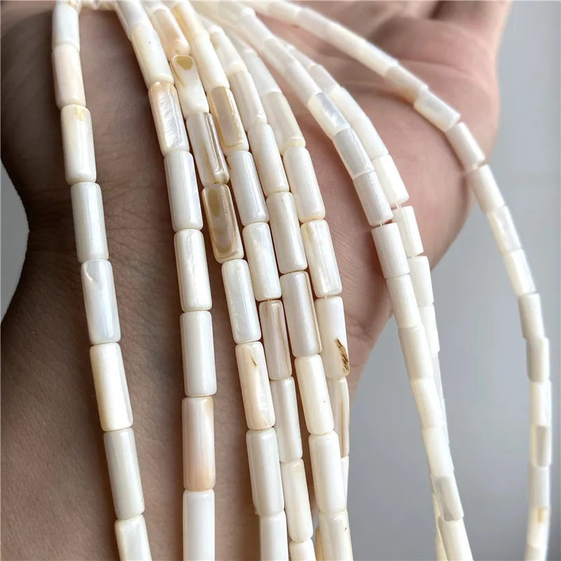 Натуральные длинные цилиндрические бусины ракушки россыпью жемчужины из родных бусин серьги-браслет оптом