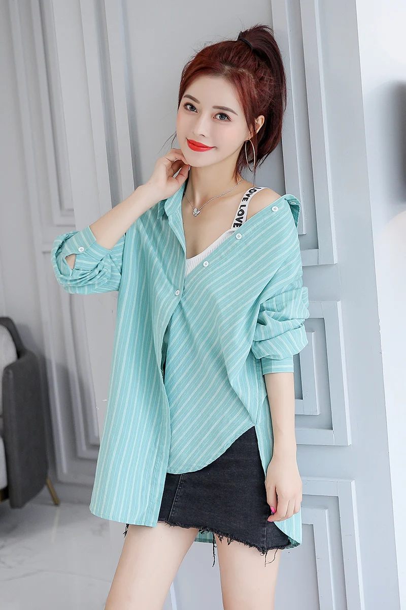 

2021 spring and summer new trend fashion solid color stripe design sense niche irregular shirt women