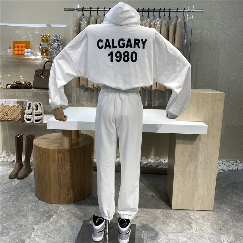 

Niche Design 2021 New College Style Casual Hooded Long Sleeve Top+ Elastic Waist Drawstring Loose And Slim Leggings Pants Suit