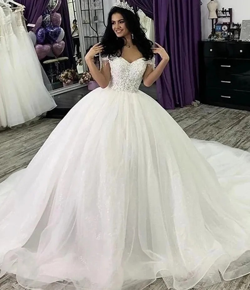 

Sparkle Shine Arabic Dubai Wedding Dresses 2021 Off Shoulder Crystal Sequins Court Train Bridal Gown Custom Made Robe De Mairee