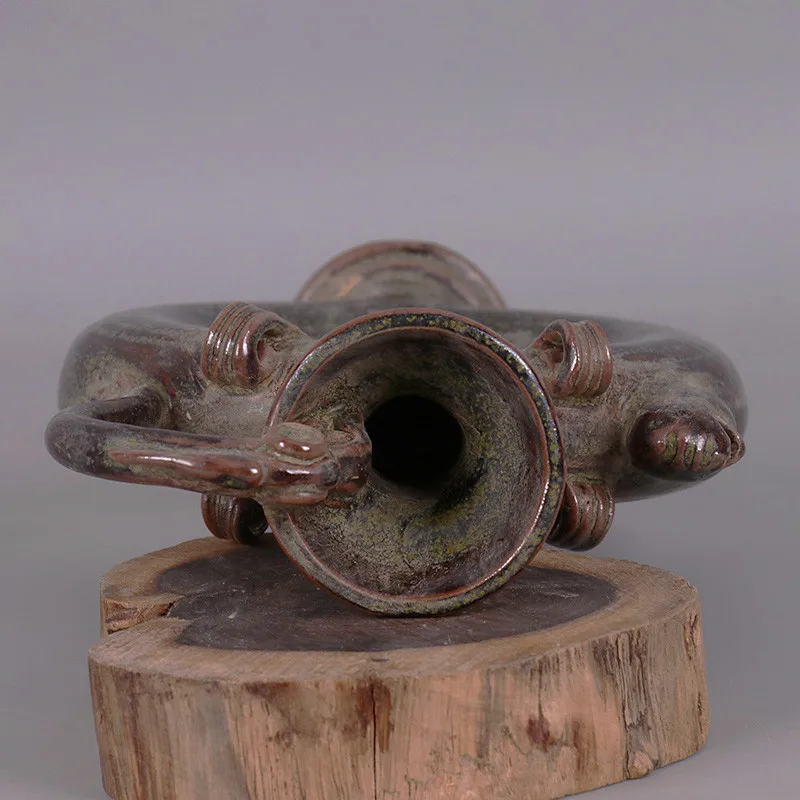 

Song Yue Kiln tea ink glazed dragon handle chicken head round center pot