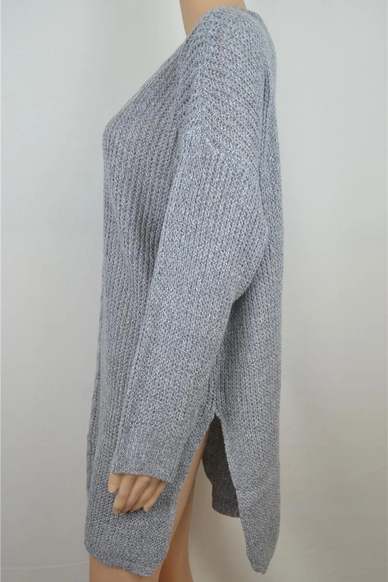 Женский трикотажный свитер свободный с разрезом и длинным рукавом вязаный