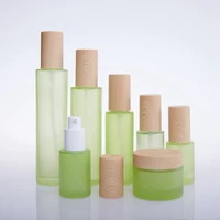 5pcslot hot sale 30 60 100 ml 20g 30g 50g empty wood grain lid green skin care bottle with press pump for cosmetic packing