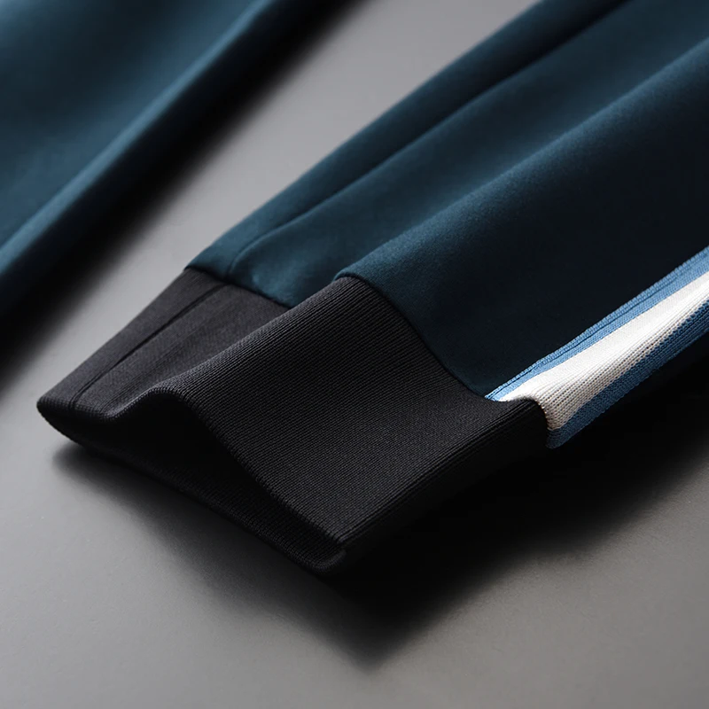 

pair of A green high-end men's trousers with informal embroidery, large men's sports pants 4XL,