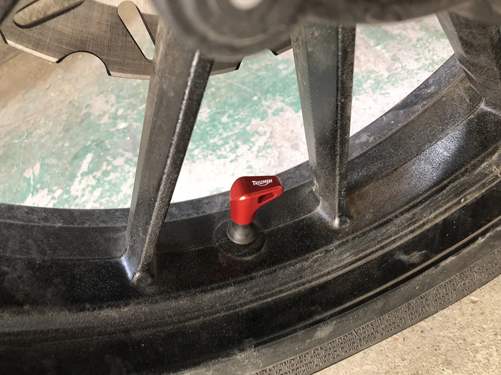 

Motorcycle Tire Valve Dustproof Cap Tyre Rim Air Port Cover For Triumph Daytona 675 Street Triple/R Tiger Explorer 1200 800 XC
