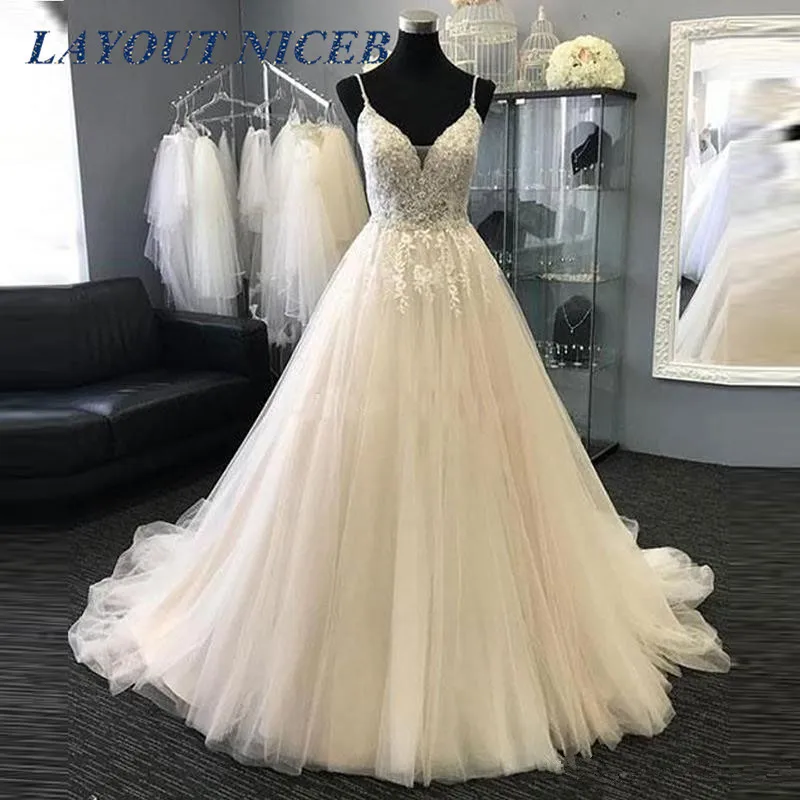 

Luxury Pearls Wedding Dresses 2019 Sexy V Neck Spaghetti Straps Appliques Lace Beaded Tulle Wedding Gowns Bridal Dresses