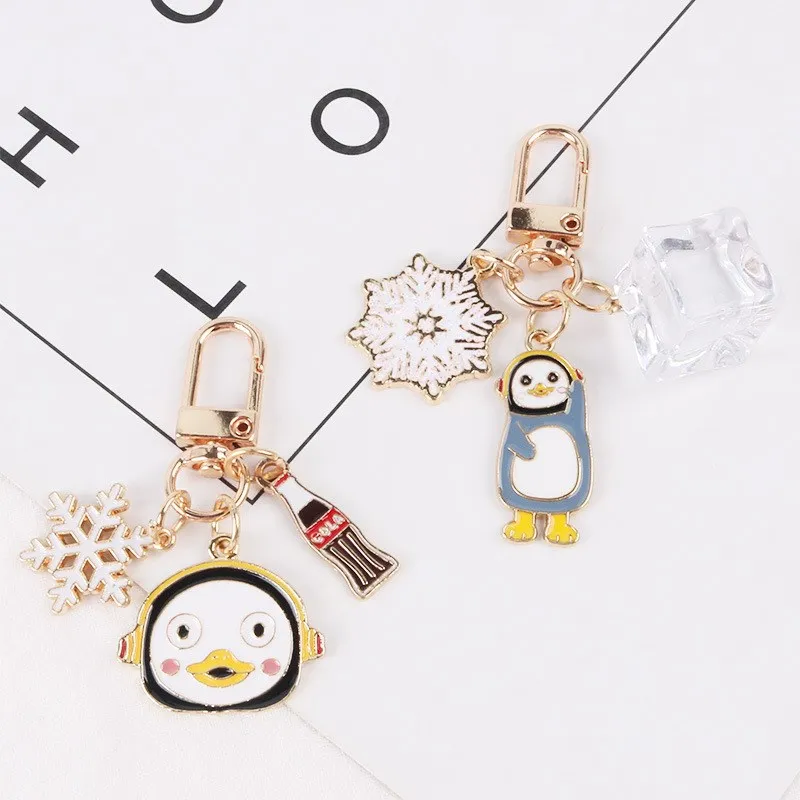 

Cartoon Snow Penguin Keychain Alloy Drop Oil Coke Snow Ice Pendant Key Ring Creative Women Bag Decoration Key Chains Wholesale