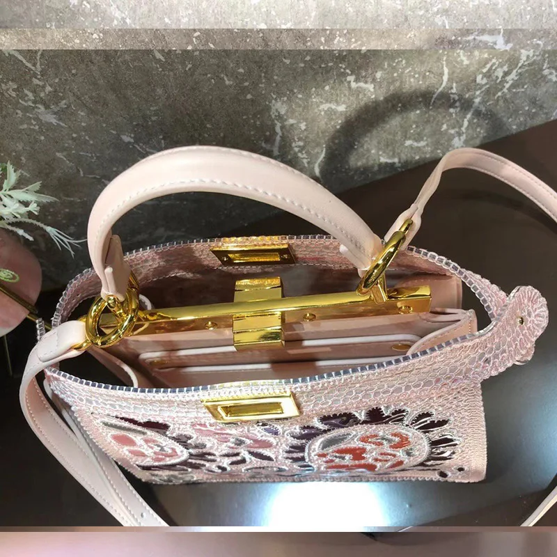 

Retro color embroidery geometric pattern large-capacity handbags ladies 2021 new style detachable shoulder strap messenger bag