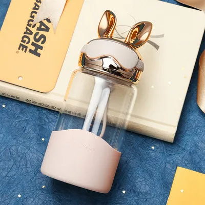 Champagne gold Креативная мультяшная бутылка для воды с кроличьими ушками, стеклянная бутылка с силиконовым рукавом, портативные бутылки для питья для женщин, подарки - Цвет: Champagne gold