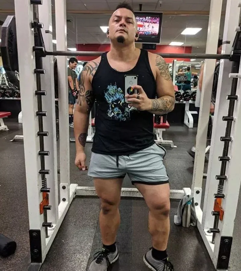 

2021 summer European and American muscle brothers fitness sports shorts men's mesh quick-drying swimming trunks running training