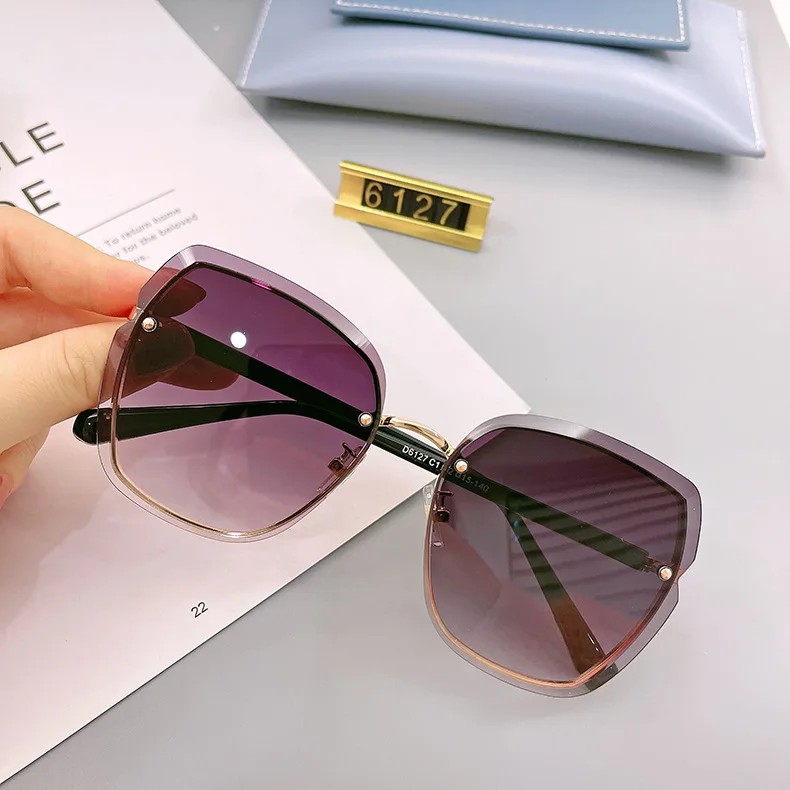 

2021 new sunglasses women's irregular trimming rimless sunglasses women's fashion in Europe and America
