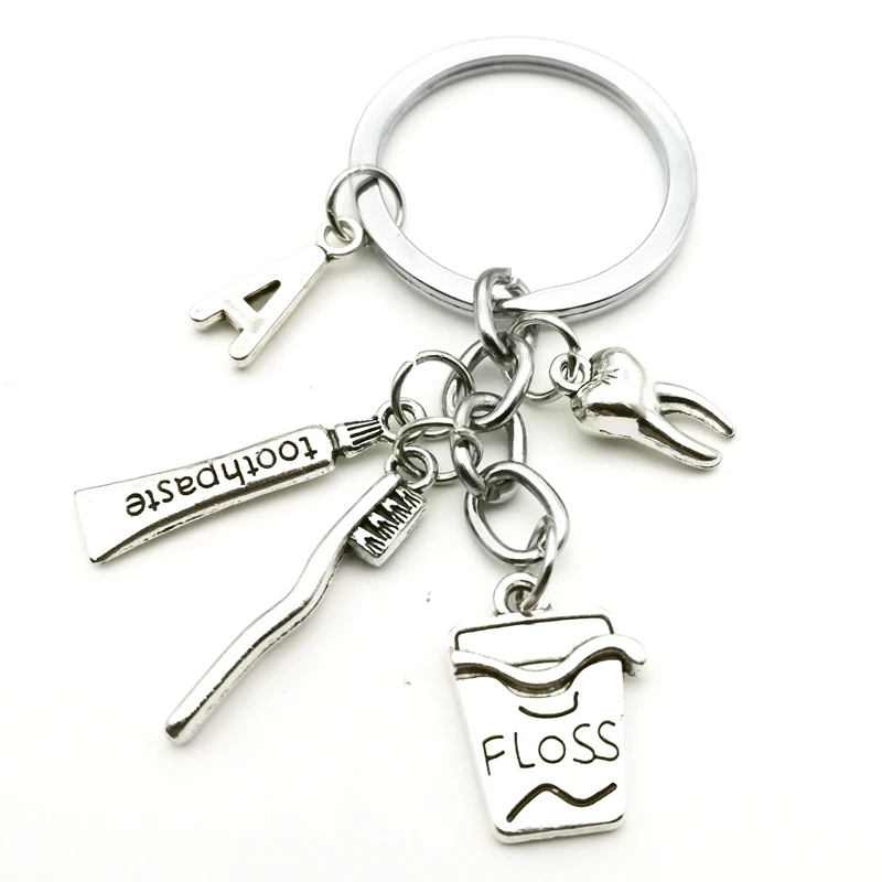 

Creative Toothpaste Pendant 26 Letters Dental Health Expert Mixed Floss Toothbrush Woman Car Keyring Jewelry Gift Charm Souvenir