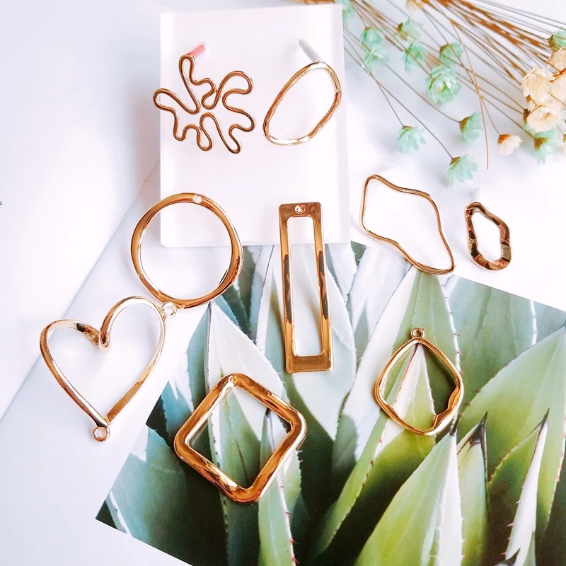 Серьги гвоздики нестандартной геометрической формы ювелирные украшения из