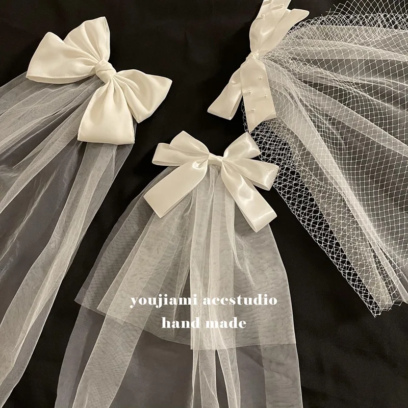 

Super fairy white bow headdress hairpin girl Mori bridal hair ornament net red photo prop headdress