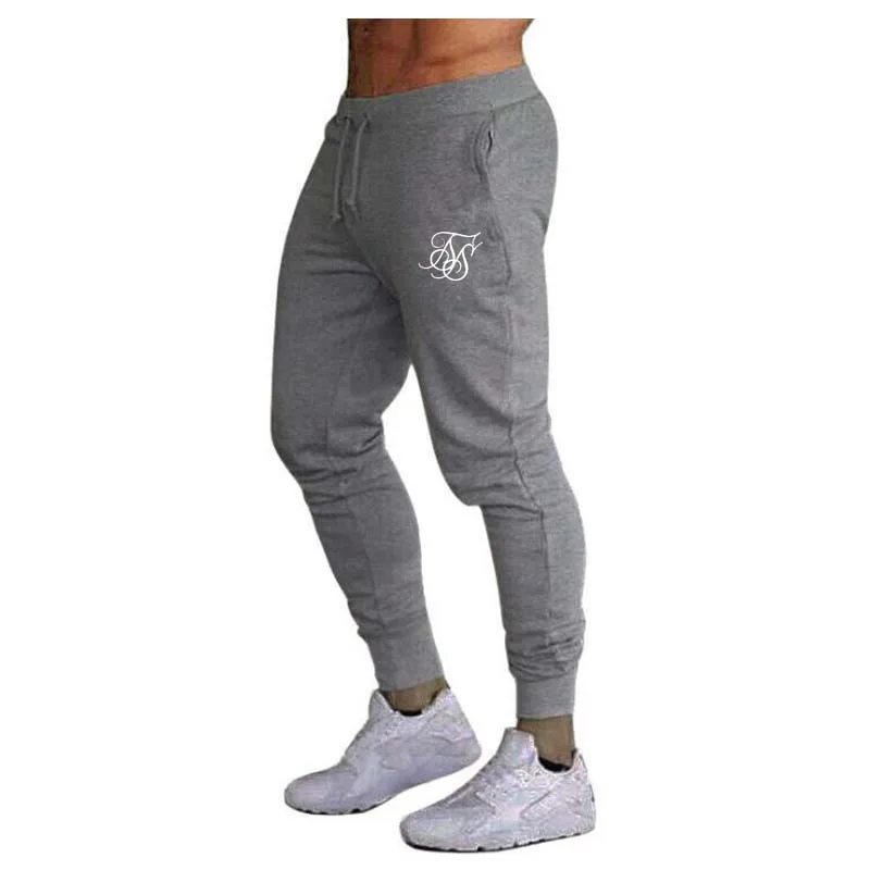 Брюки мужские для фитнеса Брендовые повседневные эластичные штаны одежда