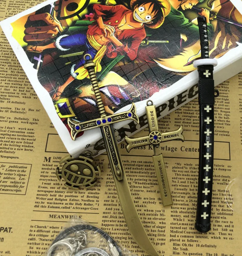 

NEW ONE PIECE Cosplay Keychain Law Luffy Hat Mihawk Black Sword Roronoa Zoro Pendant Kits Gift Cosplay Props
