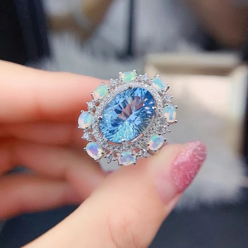 Кольцо из серебра 100% пробы с натуральным голубым топазом опалом