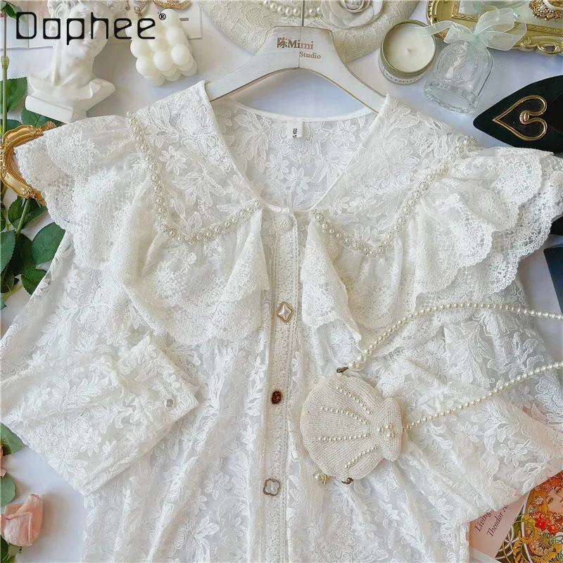 

Женская блузка с перламутровыми оборками, элегантная рубашка во французском дворцовом стиле, с кружевным воротником и элегантными пуговиц...