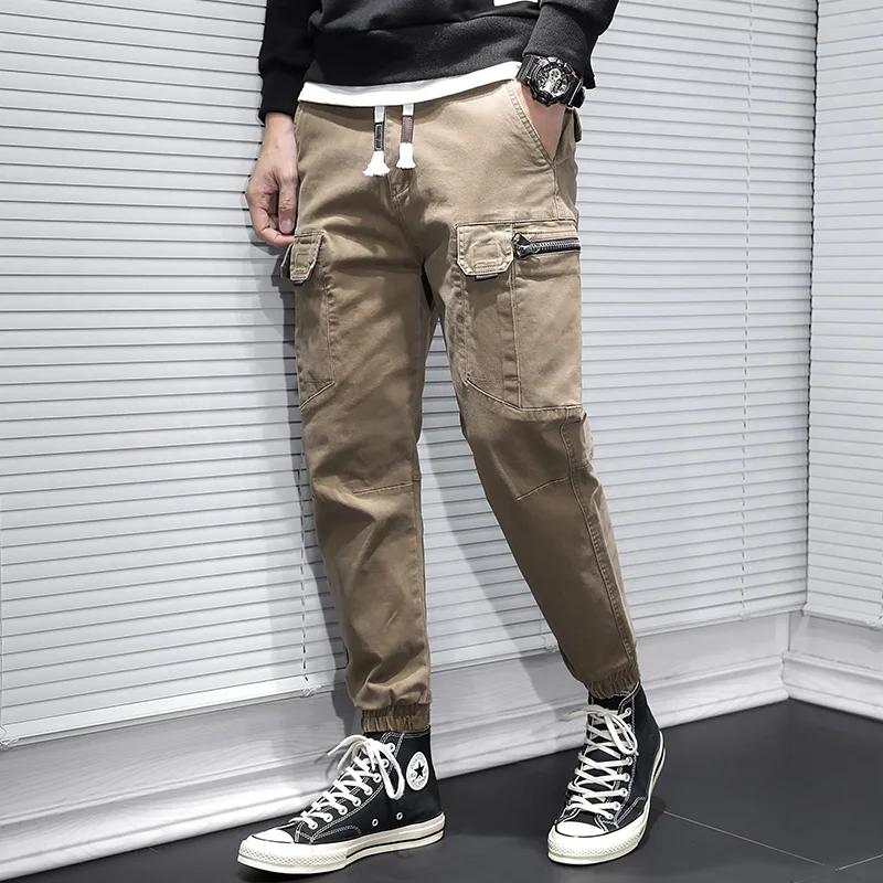 

Newly Designer Fashion Men Jeans Multi Pockets Casual Overall Cargo Pants Streetwear Hip Hop Joggers Wide Leg Baggy Trousers