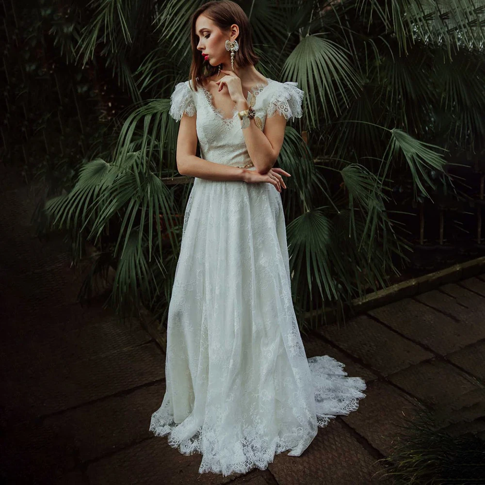 

Boho Ivory Short Sleeves Wedding Dress Open Back Romantic A Line Sash Ribbon V-neckline Lace Bohemian Beach Wedding Bridal Gowns