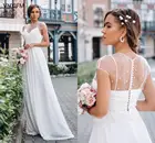 Модные жемчужные простые свадебные платья в стиле бохо, новинка 2021, с коротким рукавом, а-силуэт, пляжные садовые халаты, свадебные прозрачные платья со шлейфом