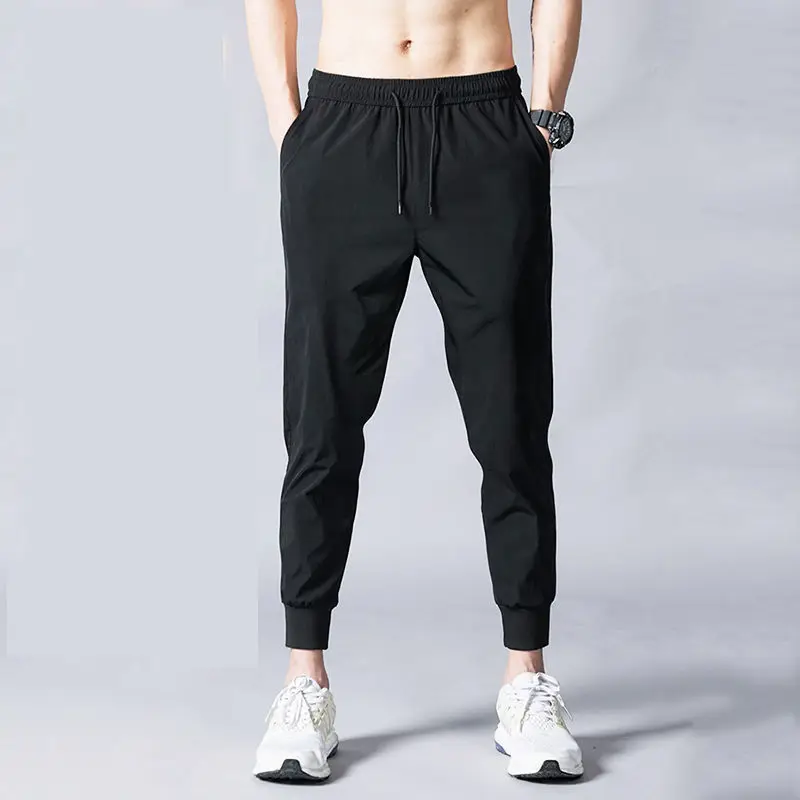 

Spring and summer new men's casual stretch trousers loose sports trend casual self-cultivation all-match small feet Harlan trous