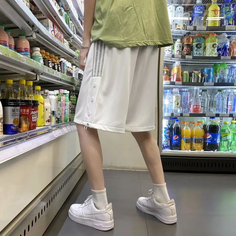 

Moisture-absorbing and breathable pants new Hong Kong style sports striped shorts casual shorts men's straight capri pants