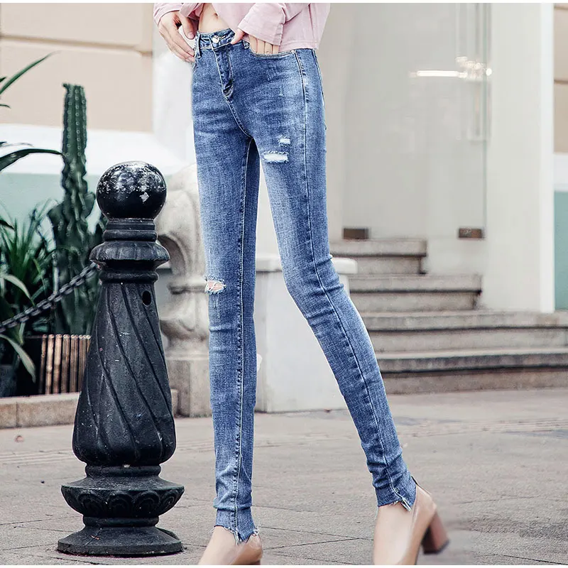 Размера плюс удлиненные дизайн отверстия зауженные джинсы Высокая талия