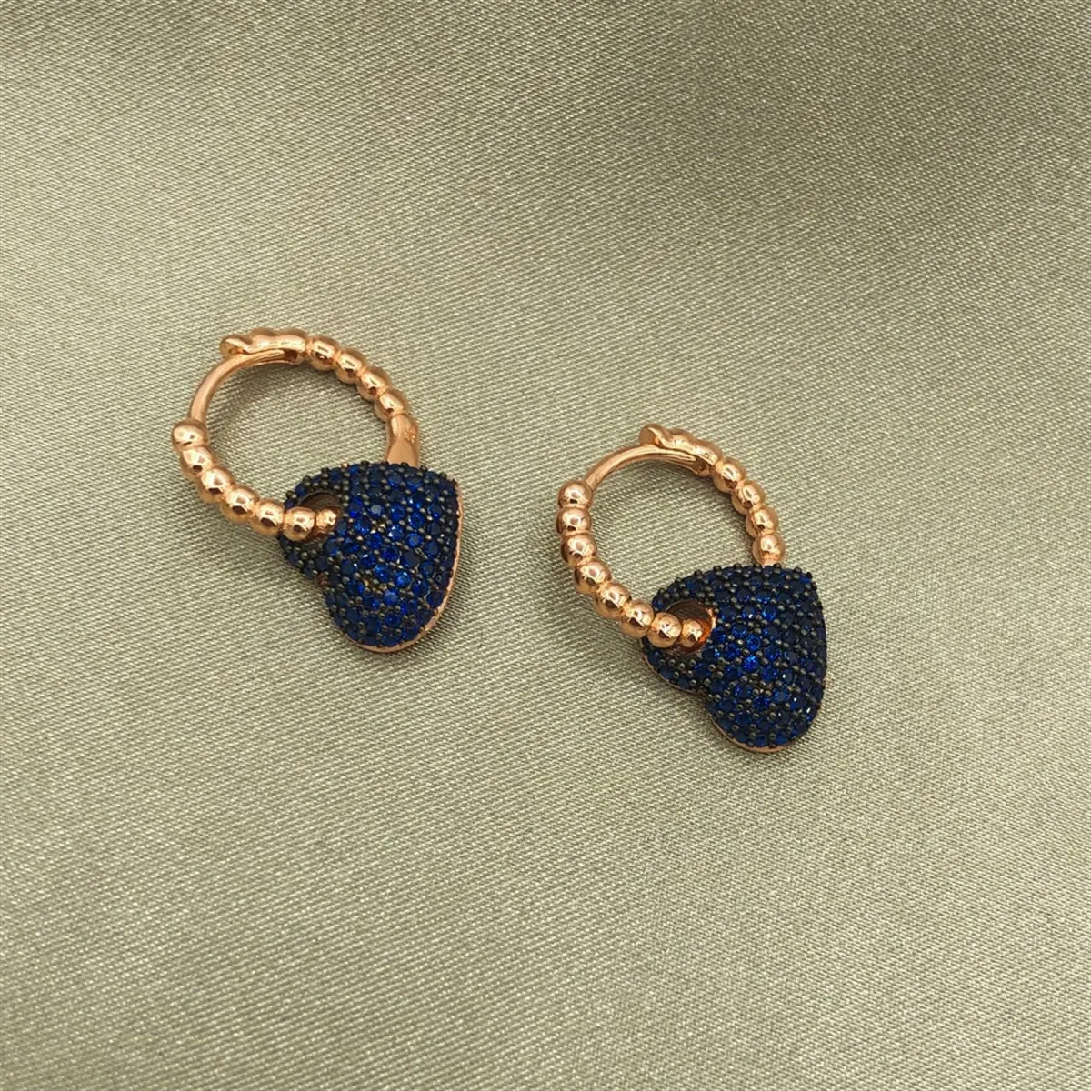 

Rose Plated Dark Blue Zircon Cubic Zirconia Hearts Earrings