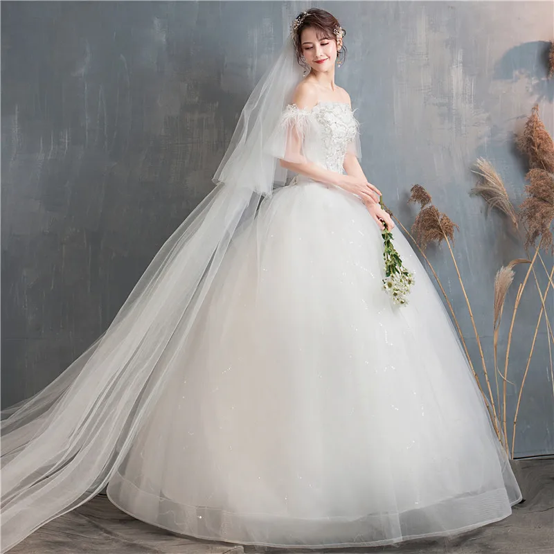 Новое Элегантное свадебное платье с вырезом лодочкой перьями и бисером вышивкой