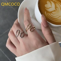 qmcoco minimalist trendy silver color rings fashion creative hollow out geometry delicacy jewelry for women party gifts