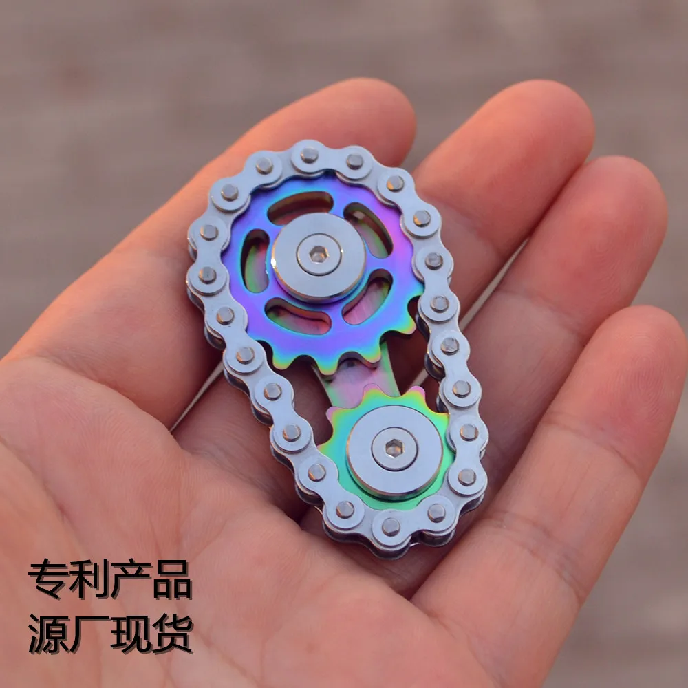 

The new seven color gear chain fingertips gyro sprocket flywheel fingertips decompression toys desk toy fidget spinner metal