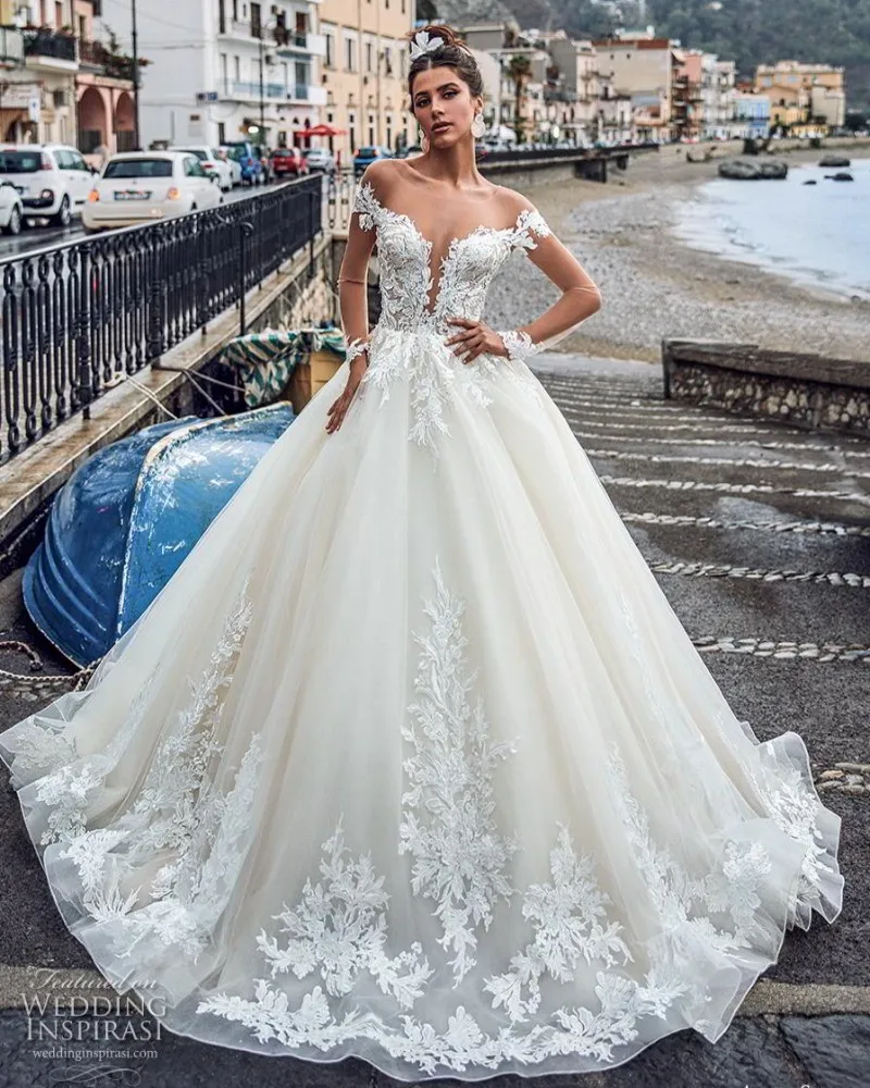 

Modest Long Sleeves Ivory Wedding Dress 2020 Lace Applique Sheer Neck Bridal Gowns Backless Tulle vestidos de novia Court Train