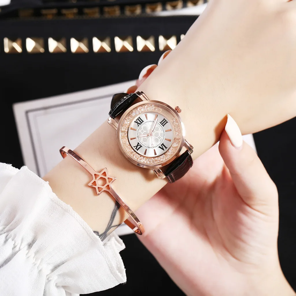 

Korean Bracelet Fashion Female Wrist Watch Business Red Leather Strap Quicksand Ball Roman Numeral Ladies Quartz Watch For Women