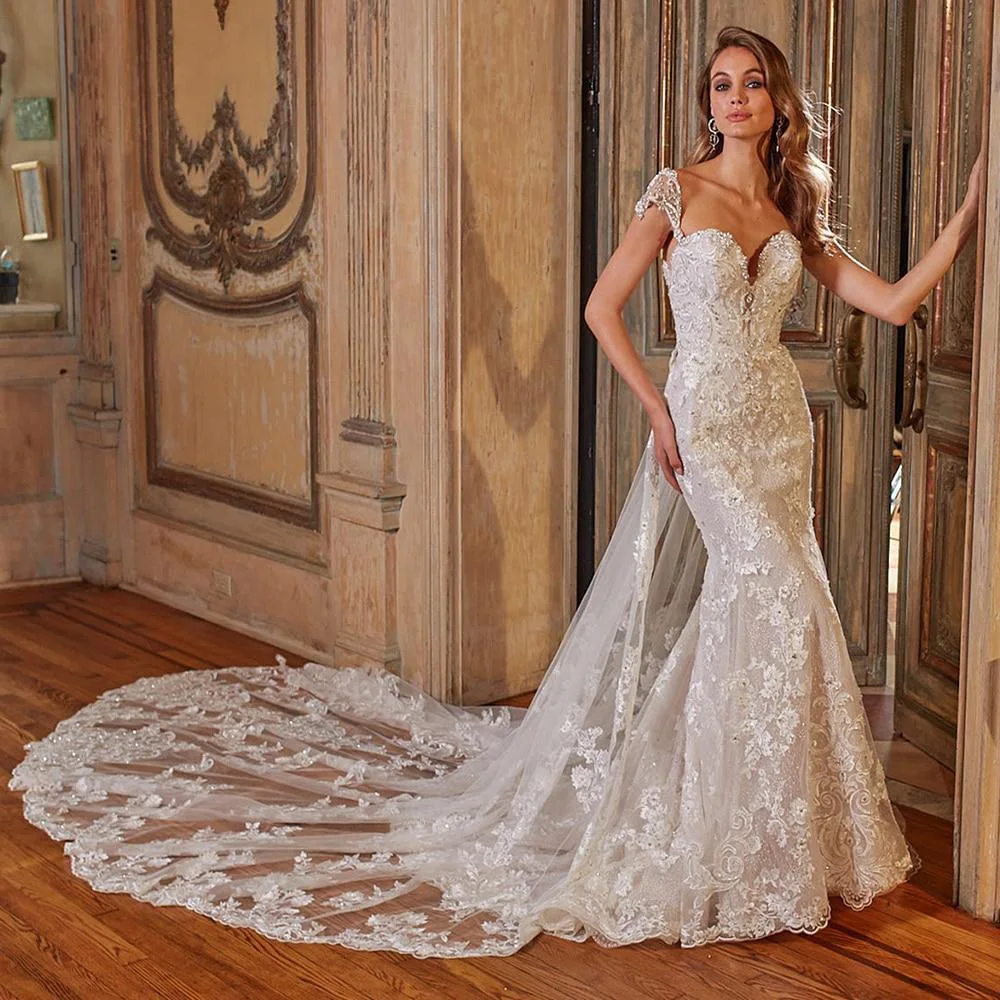 

Sexy Mermaid Wedding Dresses With Removable Train Backless Appliques Beading Crystal Gowns