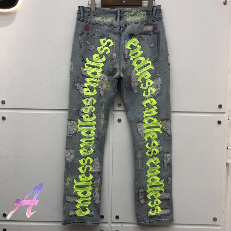 

Hip-Hop Distressed Denim Jean Men Women Top Quality Streetwear Black Fluorescent Green Letter Embroidery Denim Damage Hole Pants