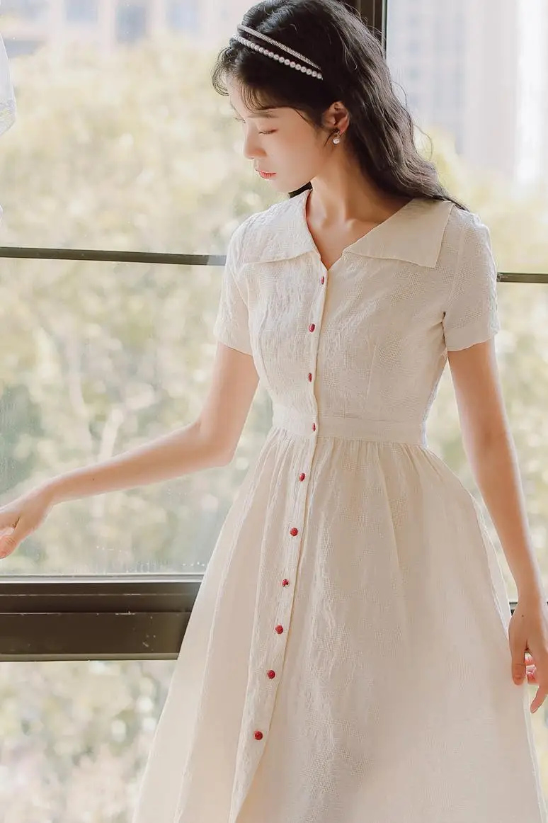 

COIGARSAM Fashion Women dress Peter pan Collar Single Breasted High Waist Dresses Shallow Apricot 5177