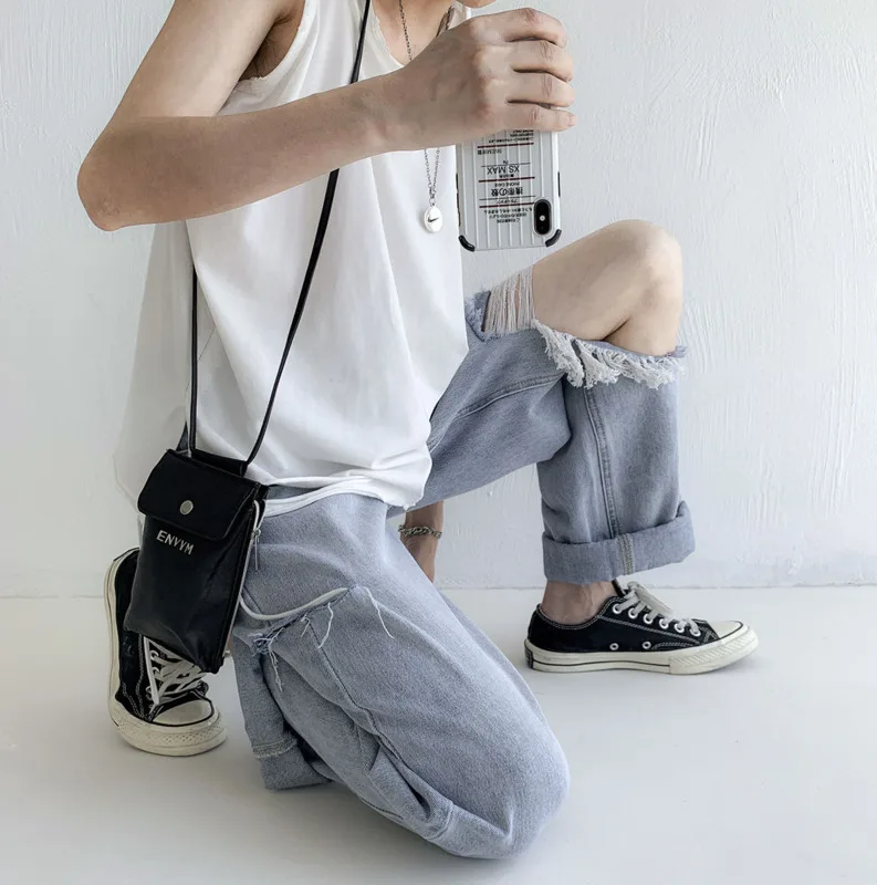 Новинка весна-лето 2020 популярные мужские свободные однотонные рваные джинсы