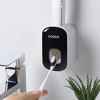 automatic toothpaste dispenser squeezer black grey toothpaste dust proof toothbrush holder wall mount stand bathroom accessories