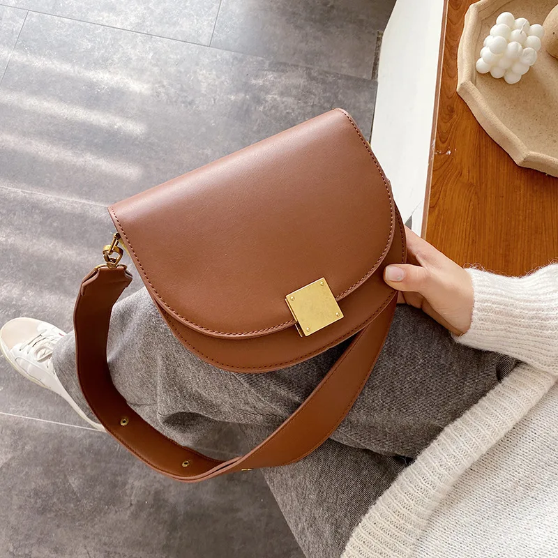 

Vintage Fashion Solid Color Saddle Bag 2021 New High Quality Leather Women's Designer Handbag Lock Shoulder Messenger Bag Purses