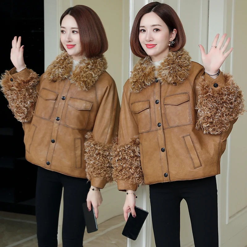Куртка из натуральной кожи с воротником лисьего меха осенне зимнее пальто