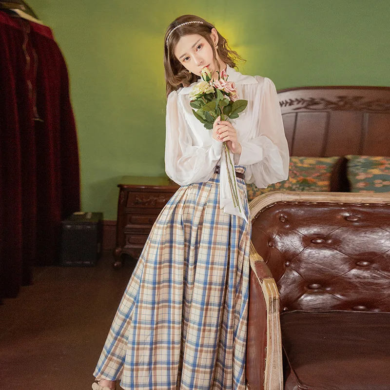 

Women's wear age-reducing thin suit ocean air lantern sleeve shirt and retro college checkered pleated skirt