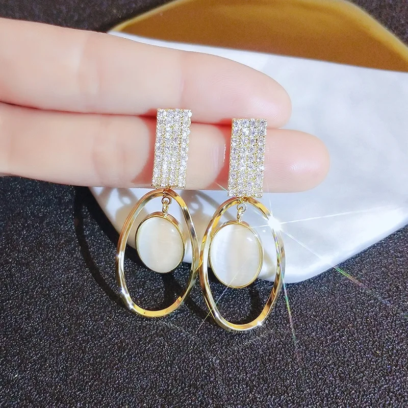 

Frosty Wind Opal Earrings Korean Version of Micro-inlaid Rhinestone Earrings Silver Needle Temperament Ladies Wind Ear Jewelry