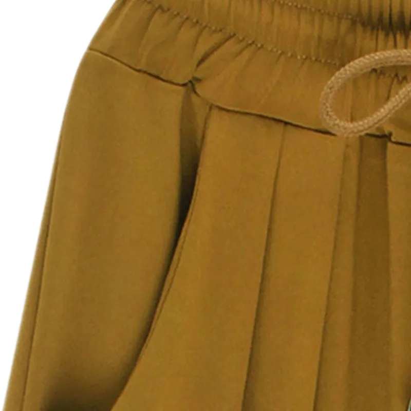 Брюки женские летние с широкими штанинами эластичные свободные штаны-султанки в