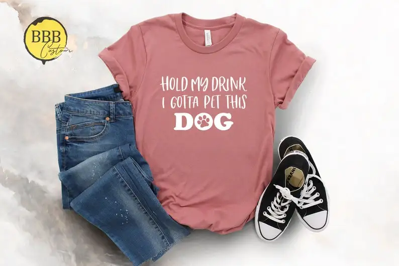 

Hold My Drink I Gotta Pet This Dog Shirt, Dog Lover Shirt, Dog Mom, Life Goal Pet All The Dogs Shirt,Funny Shirt