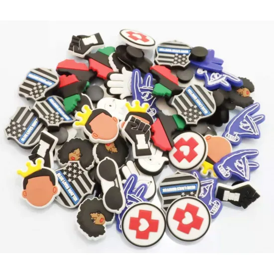 

100PCS Mixed shoe charms with JIBZ on the back picked at random R018