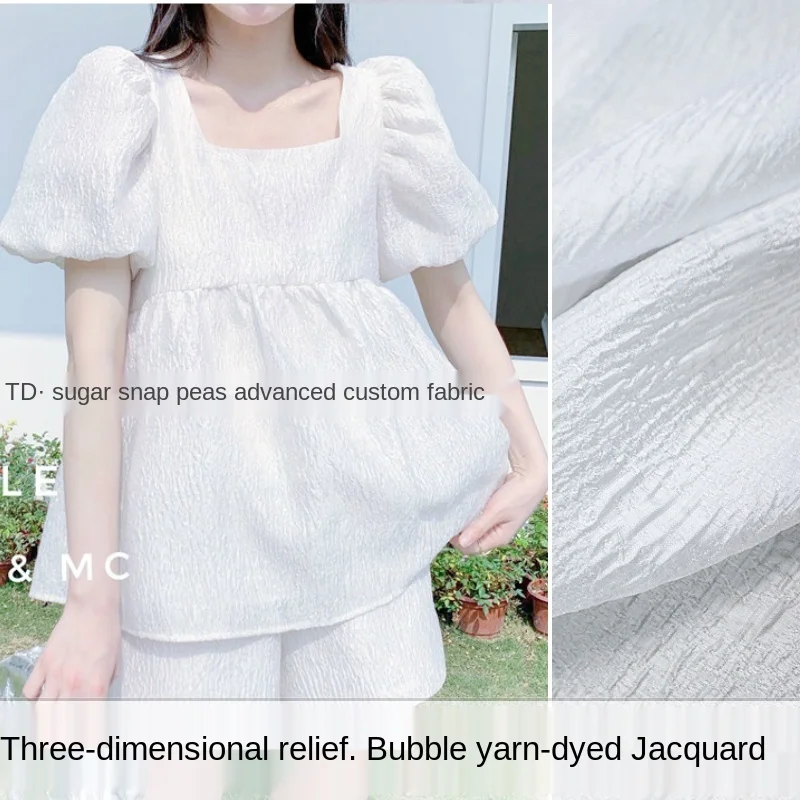 

European jacquard dress fabric spring three-dimensional embossed bubble thin section yarn-dyed top pants dark brocade fabric