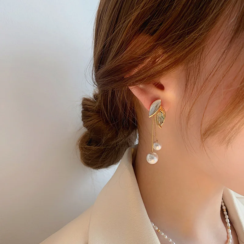 

S925 silver needle leaf tassel pearl earrings niche design earrings temperament personality net red earrings female