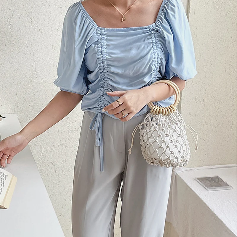 

New 2021 Summer Women Canvas Small Beach Bag Personality Ring Handbag Fashion Hollow Bucket Creative Hemp Rope Woven Hand Bag