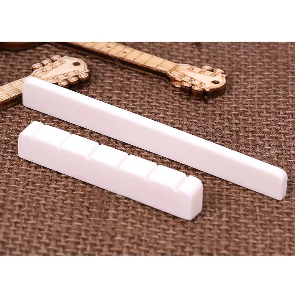 

2021 Top selling 6 String Classical Guitar Saddle + Nut White Bone Bridge For Acoustic Folk Guitar Accessories buffalo bone